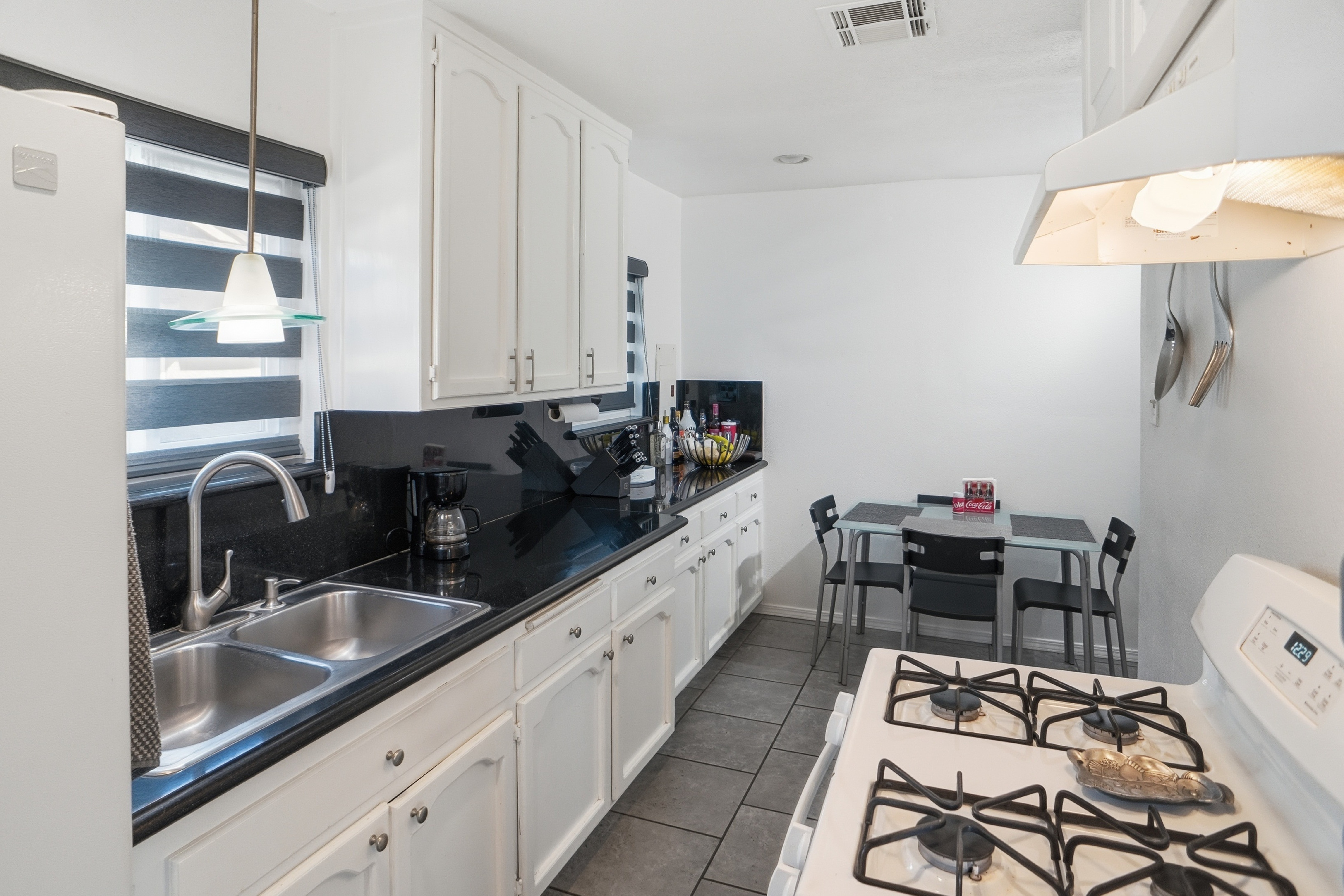 Kitchen with granite counters and oak cabinets